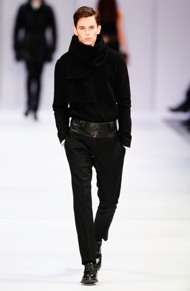BERLIN, GERMANY - JANUARY 17:  A model walks the runway at Hugo By Hugo Boss Autumn/Winter 2013/14 fashion show during Mercedes-Benz Fashion Week Berlin at Opernwerkstatte on January 17, 2013 in Berlin, Germany.  (Photo by Peter Michael Dills/Getty Images for Mercedes-Benz)